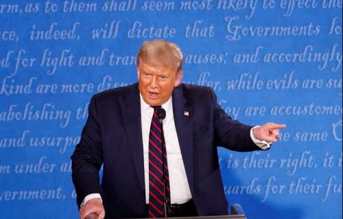 U.S. President Donald Trump and Democratic presidential nominee Joe Biden participate in their first 2020 presidential campaign debate held on the campus of the Cleveland Clinic at Case Western Reserve University in Cleveland, Ohio, U.S., September 29, 2020. REUTERS/Brian Snyder