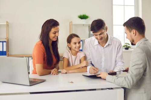 Family with child meeting with banker