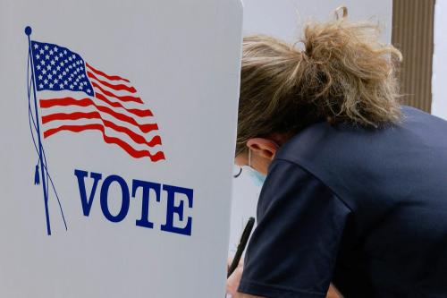 A voter marks a ballot during the primary election and abortion referendum at a Wyandotte County polling station in Kansas City, Kansas, U.S. August 2, 2022.  REUTERS/Eric Cox