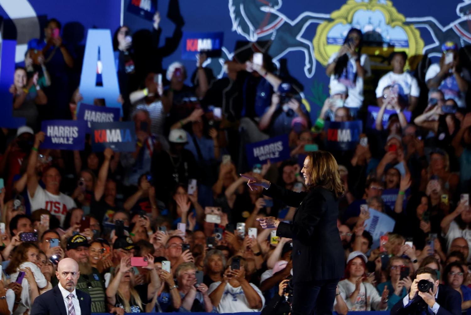 Democratic presidential nominee and U.S. Vice President Kamala Harris gestures onstage during a campaign event in Wilkes-Barre, Pennsylvania, U.S., September 13, 2024.